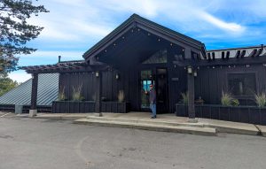 Chris arriving at the dark-painted entrance of Robert Keenan Winery on Spring Mountain, Napa Valley