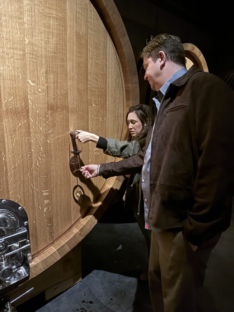 Wine tasting from barrel at Promentory