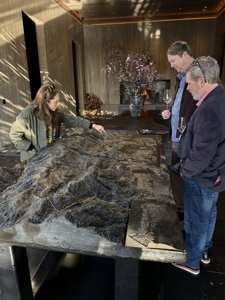 Tasting room with vineyard terrain model at Promontory