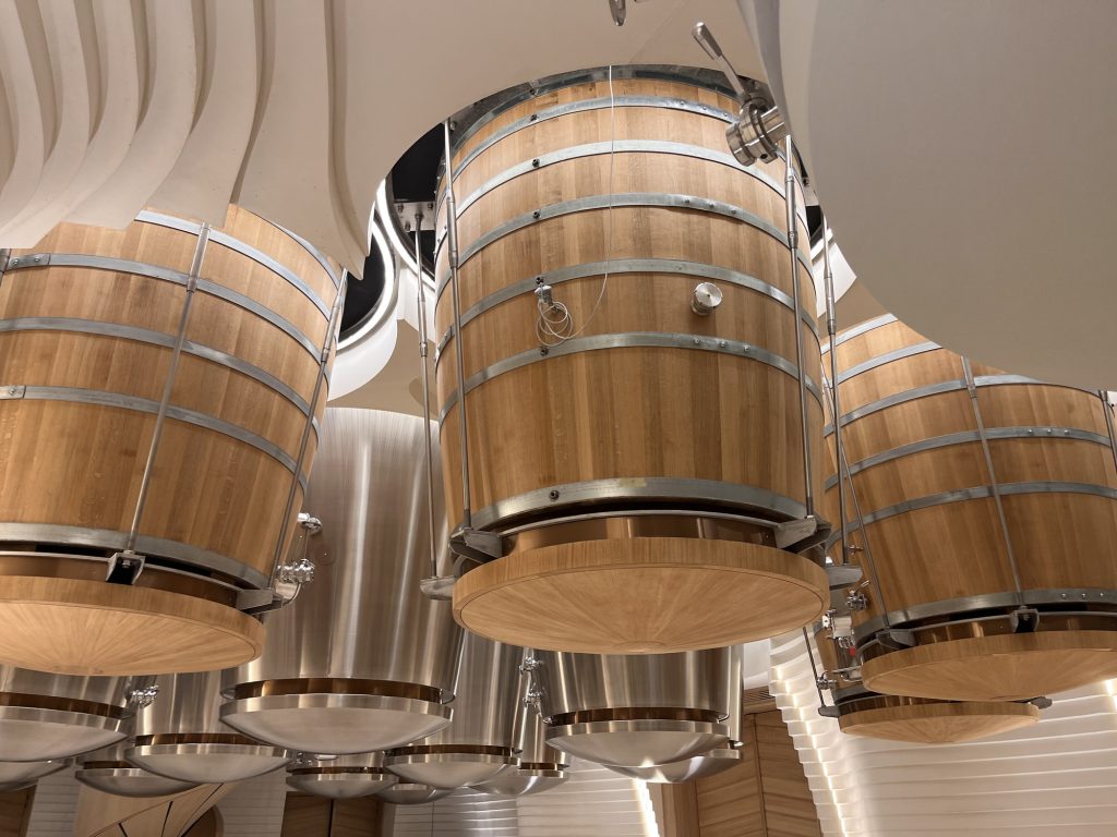 Overhead view of suspended oak fermentation vats at Château Angélus, Saint-Émilion, Bordeaux