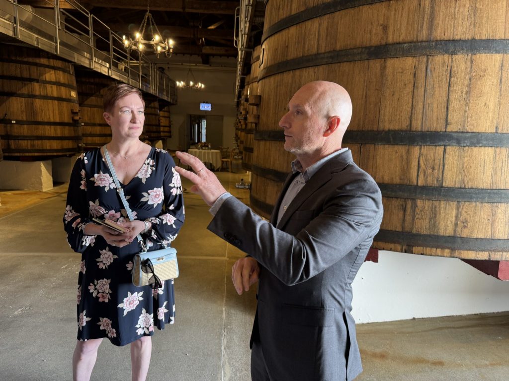Tasting discussion among the historic foudres at Château Margaux, Premier Grand Cru Classé, Bordeaux