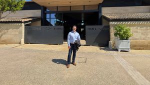 Nick in front of the Chateau Figeac entrance
